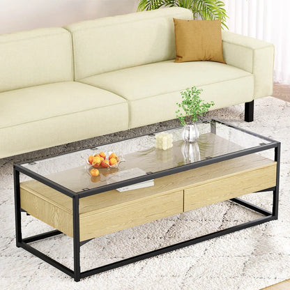 Modern glass top coffee table with wood drawers and black metal frame in living room