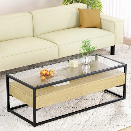 Modern glass top coffee table with wood drawers and black metal frame in living room