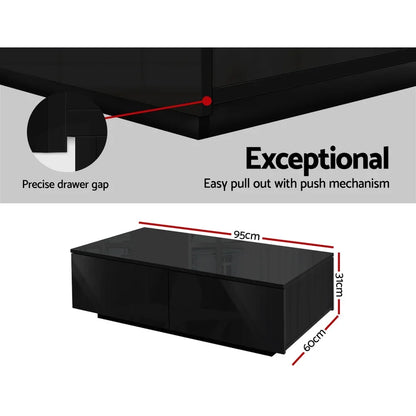 Black coffee table with push-to-open drawers, glossy finish, and precise drawer gaps, 95x60x31cm.