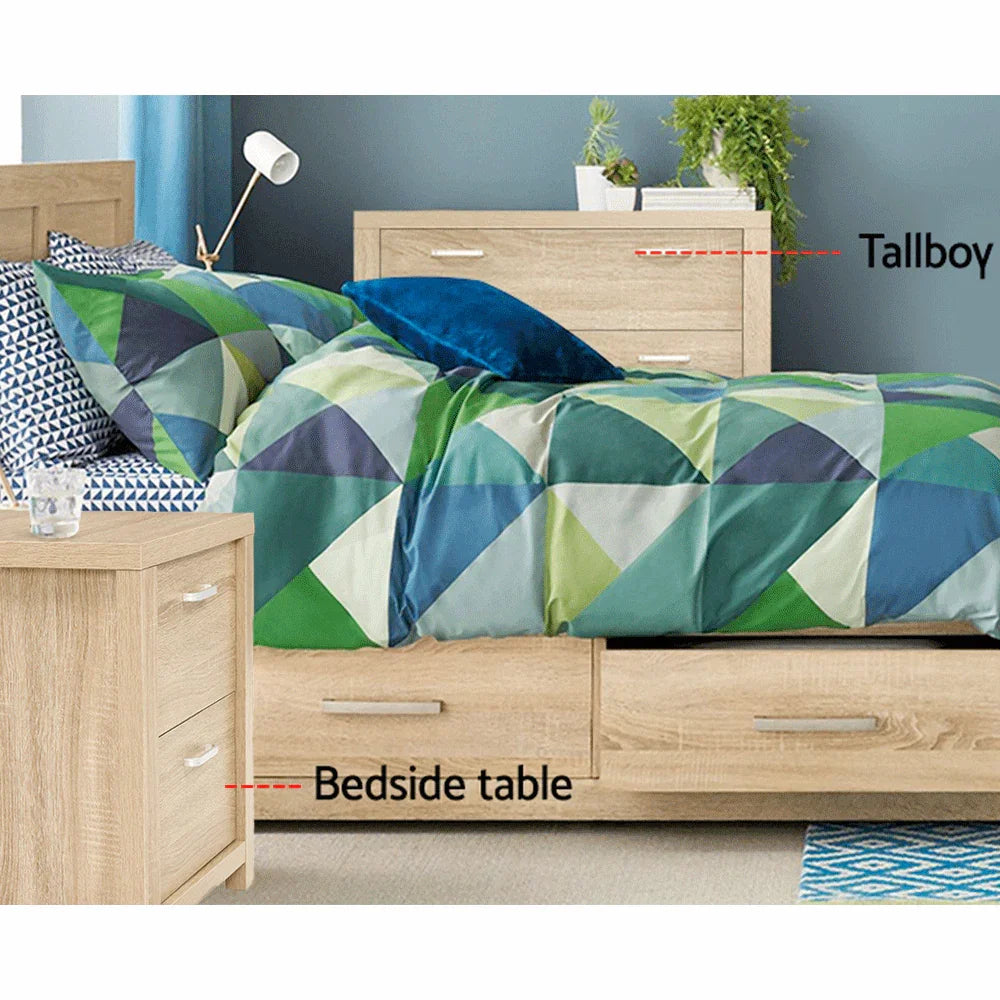 Modern bedroom with geometric bedding, light wood bedside table, and tallboy dresser