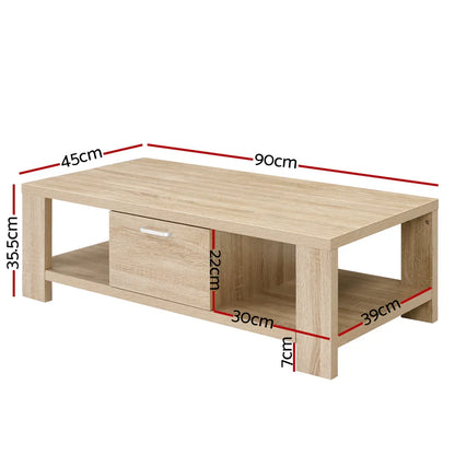 Modern wooden coffee table with drawer, open shelf, and measured dimensions in centimeters