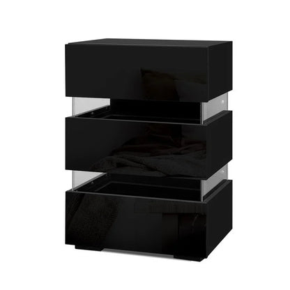 Modern black bedside table with three glossy drawers and transparent side panels
