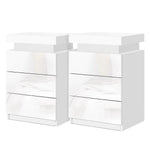 Set of two modern white high gloss LED bedside tables with three drawers