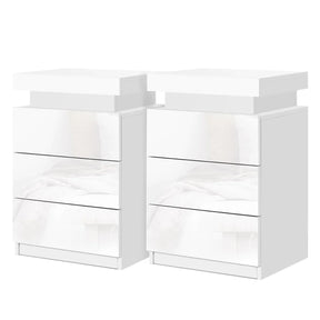 Set of two modern white high gloss LED bedside tables with three drawers