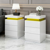 Modern white LED nightstands with yellow accent lighting, in a marble-floored room