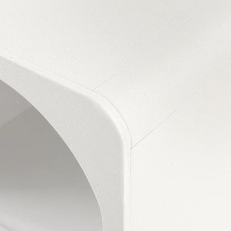 Close-up of modern white minimalist furniture with smooth rounded corner detail