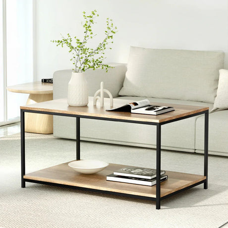 Modern wood coffee table with black metal frame in minimalist living room with beige sofa