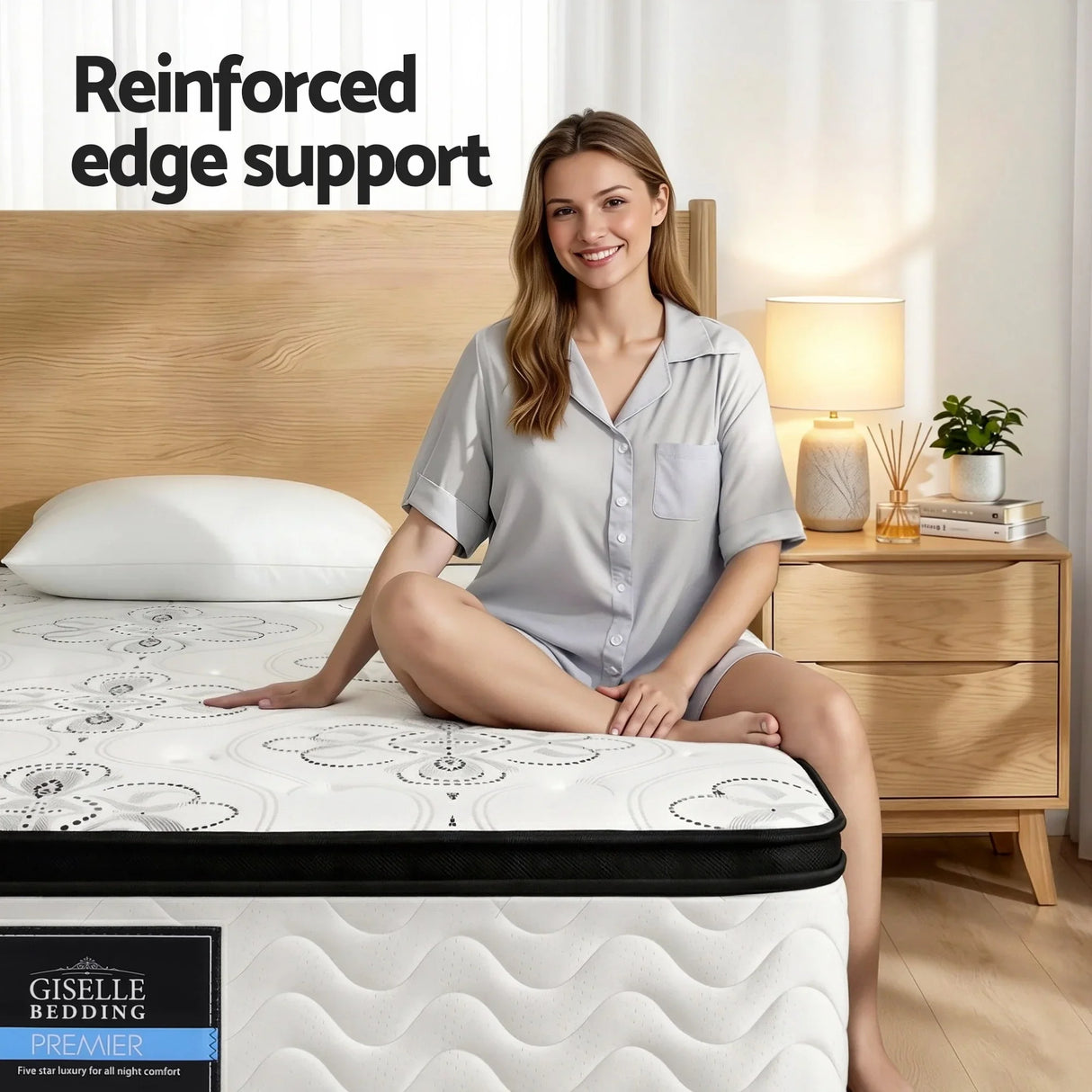 Woman sitting on queen mattress with reinforced edge support in modern bedroom, Flea Market AU