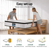 Couple easily sets up a boxed mattress on a wooden bed frame, step-by-step guide below.