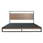 Modern bed frame with black metal and wood panel headboard and footboard, minimalist design