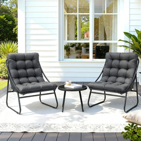 Outdoor patio set with two black cushioned chairs and a round table, modern garden furniture