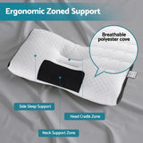 Ergonomic white pillow with black mesh neck support zone on gray sheet, labeled side sleep and head cradle zones