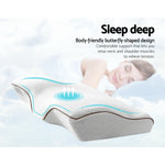 Butterfly-shaped ergonomic pillow with airflow design for neck and shoulder support, woman sleeping peacefully