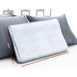 Memory foam pillow with white hexagonal pattern cover, 60x40 cm, on grey cushions