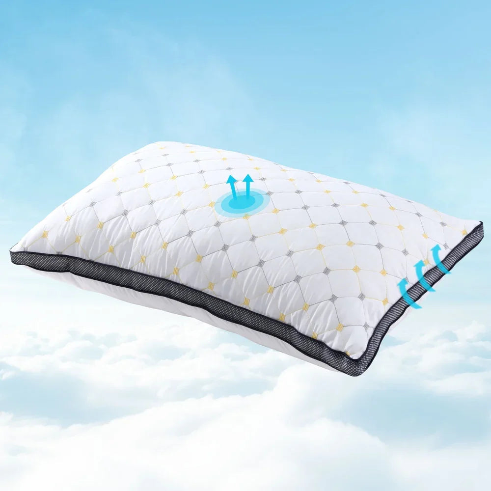 White breathable pillow with black mesh edges floating above clouds, showing airflow arrows