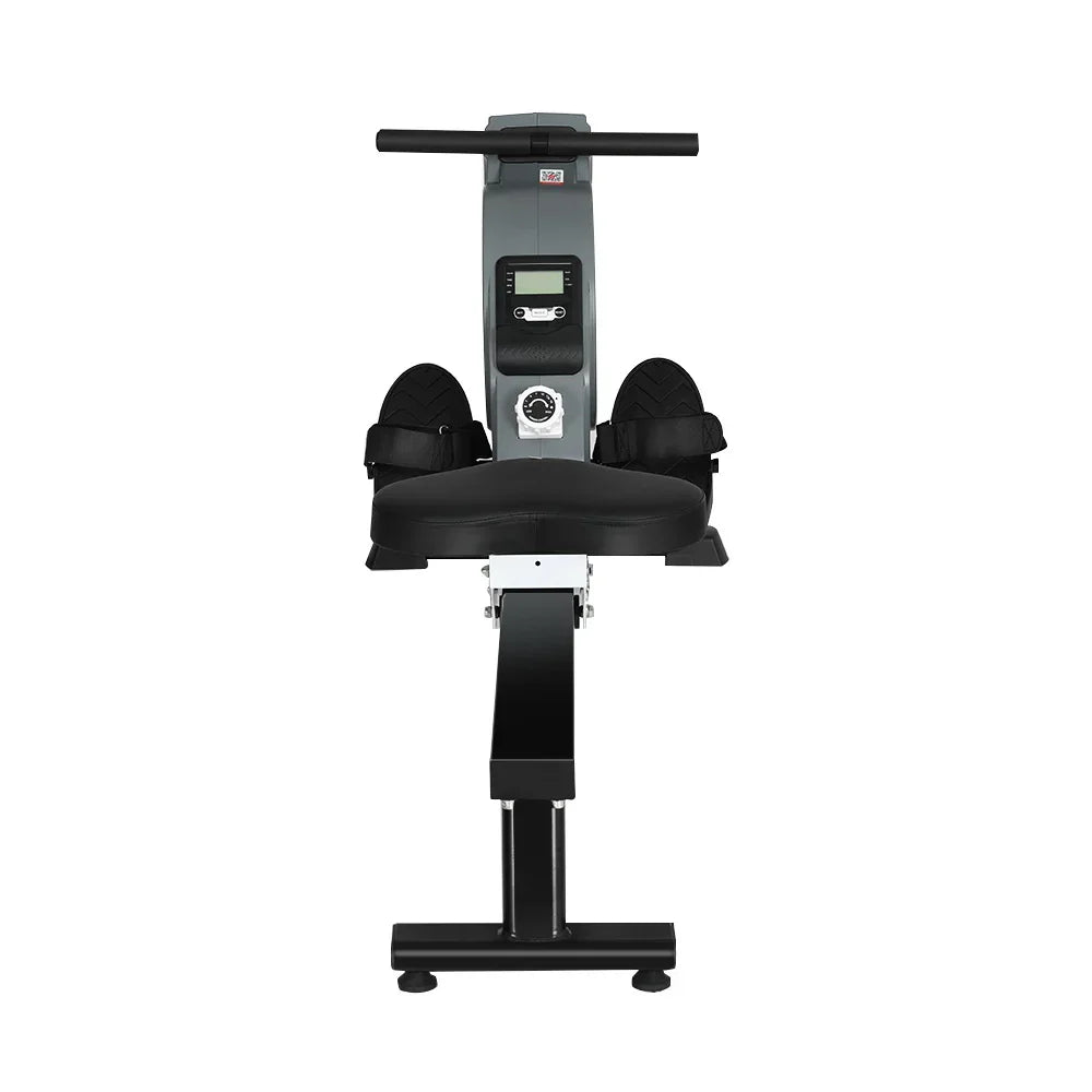 Black and silver rowing machine with digital display, foot straps, and padded seat on white background