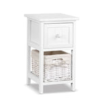 White wooden nightstand with a drawer and a wicker basket storage shelf