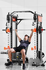 Man bench pressing on a multi-functional home gym Smith machine