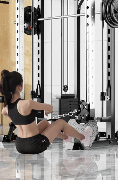 Woman in gym clothes using cable row machine in modern fitness center