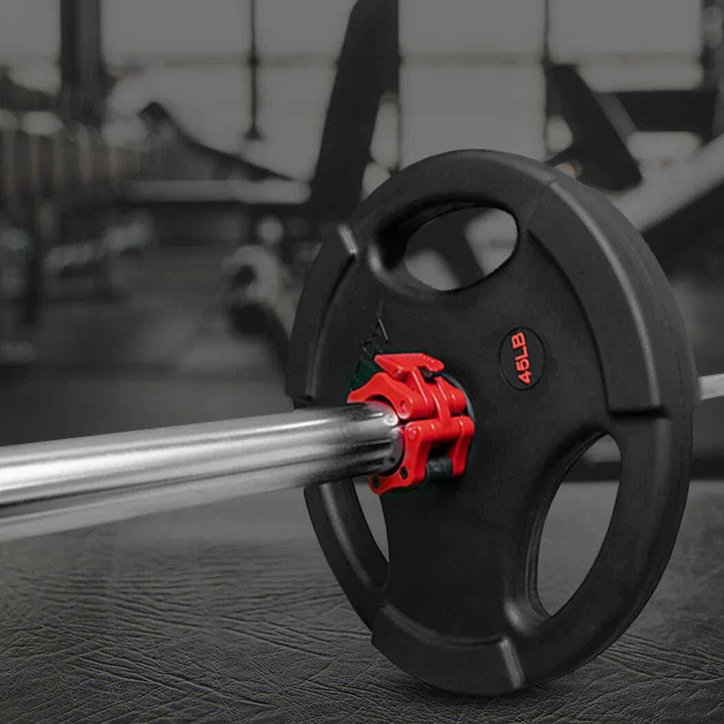46 lb black weight plate on barbell with red collar in gym setting
