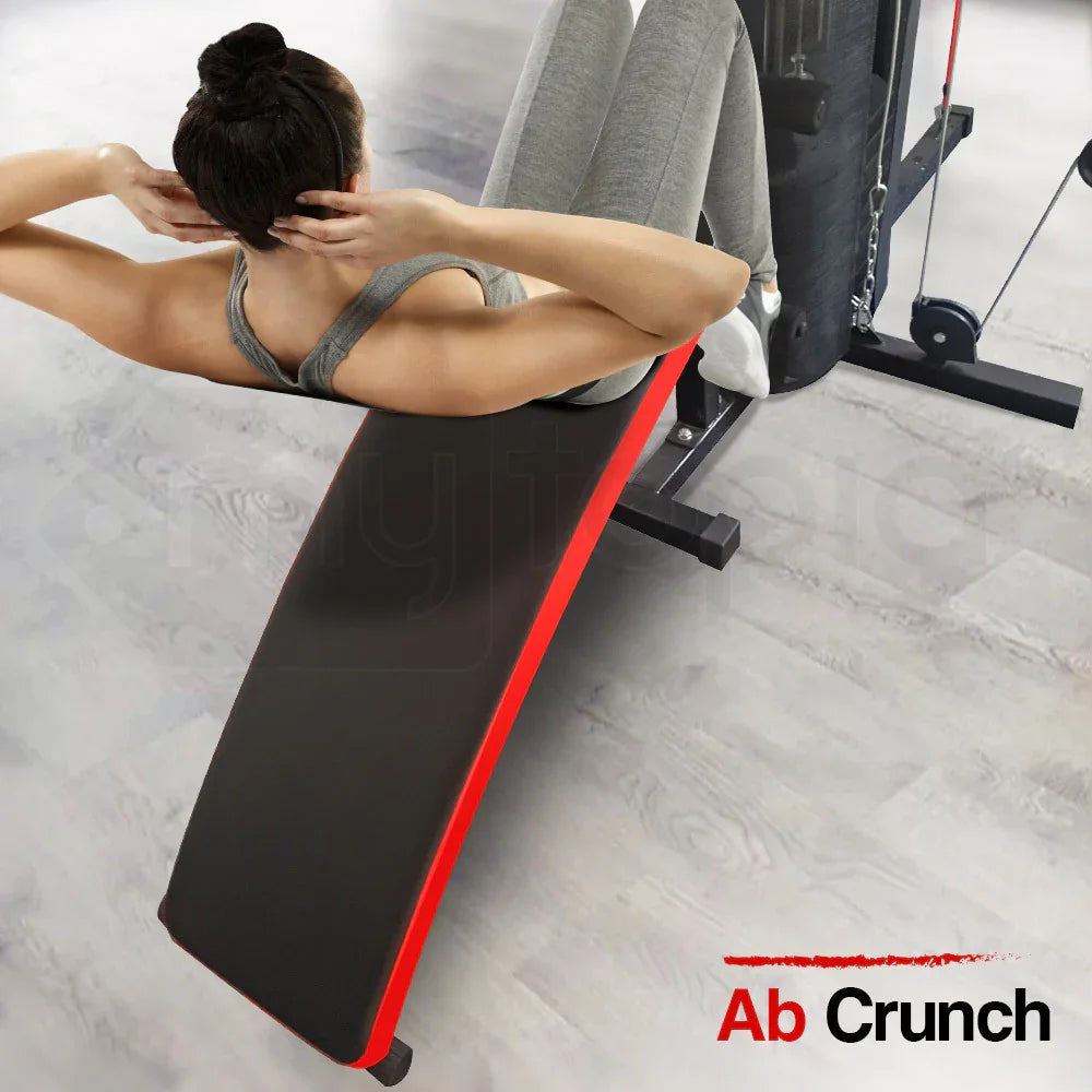 Woman doing ab crunch on incline bench gym equipment, home fitness workout