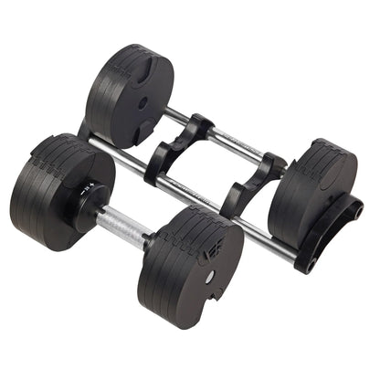 Adjustable black dumbbell with metal handle on a holder, home gym fitness equipment