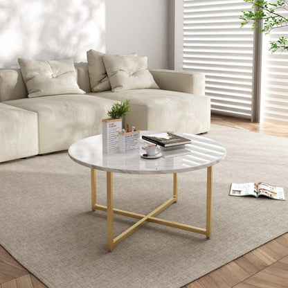 Modern living room with marble coffee table, gold metal base, beige sofa, and neutral decor