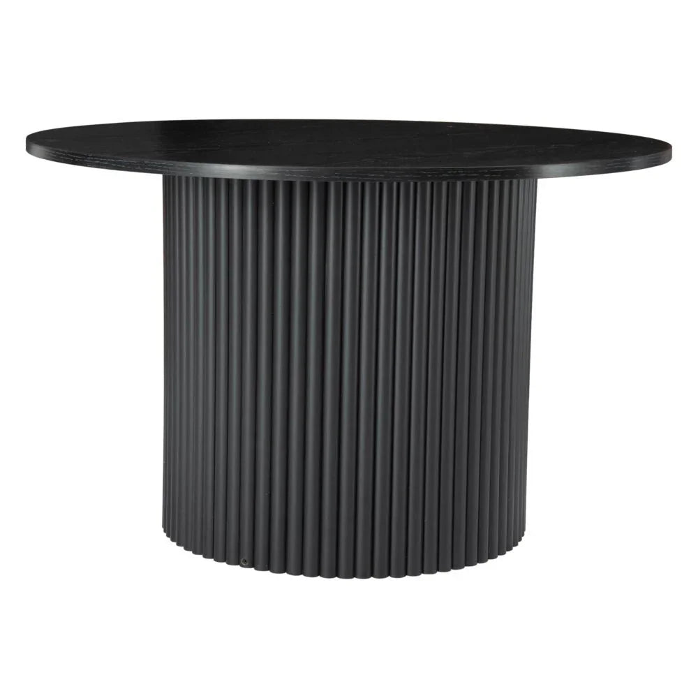 Round black modern dining table with fluted cylindrical base and smooth top