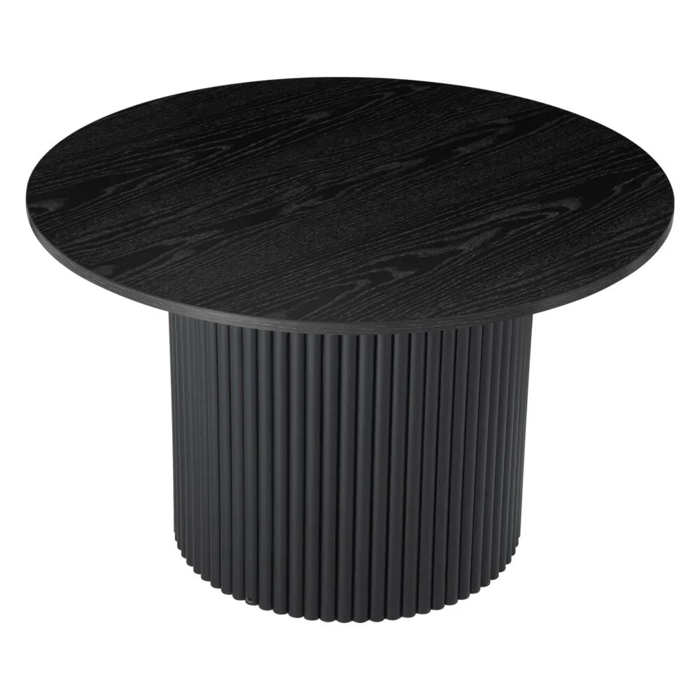 Black round dining table with a ribbed cylindrical base and wood grain texture