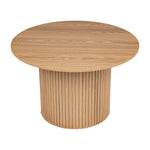Round natural wood dining table with fluted pedestal base, modern minimalist design