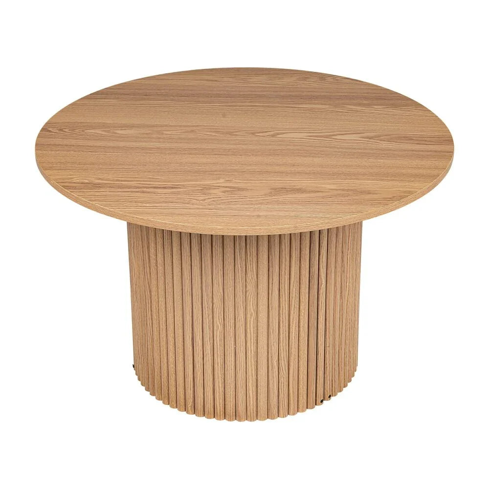 Round natural wood dining table with fluted pedestal base, modern minimalist design