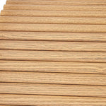 Natural wood slat wall panel with light oak finish and visible wood grain texture