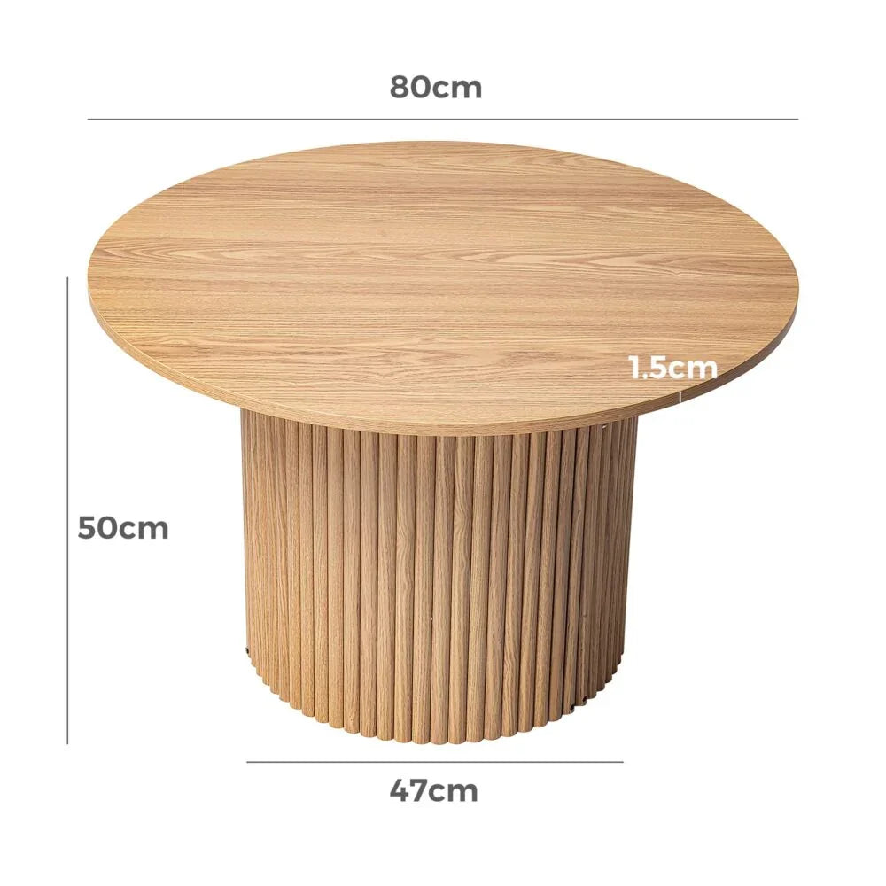 Round wooden coffee table with fluted base and dimensions 80x47x50x1.5cm shown.