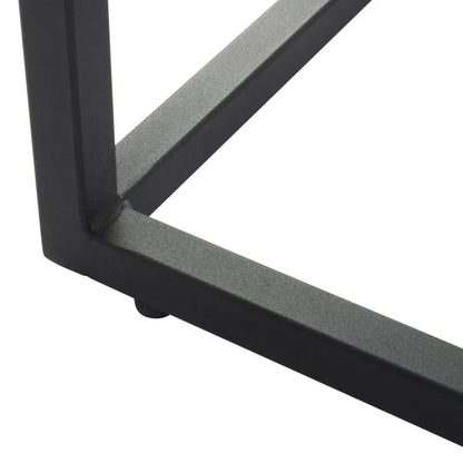Close-up of black metal table leg frame with a matte finish against a white background
