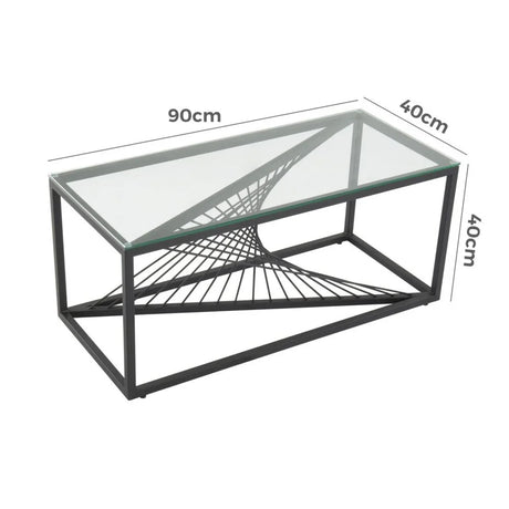 Rectangular glass coffee table with black metal frame and geometric base, 90x40x40cm