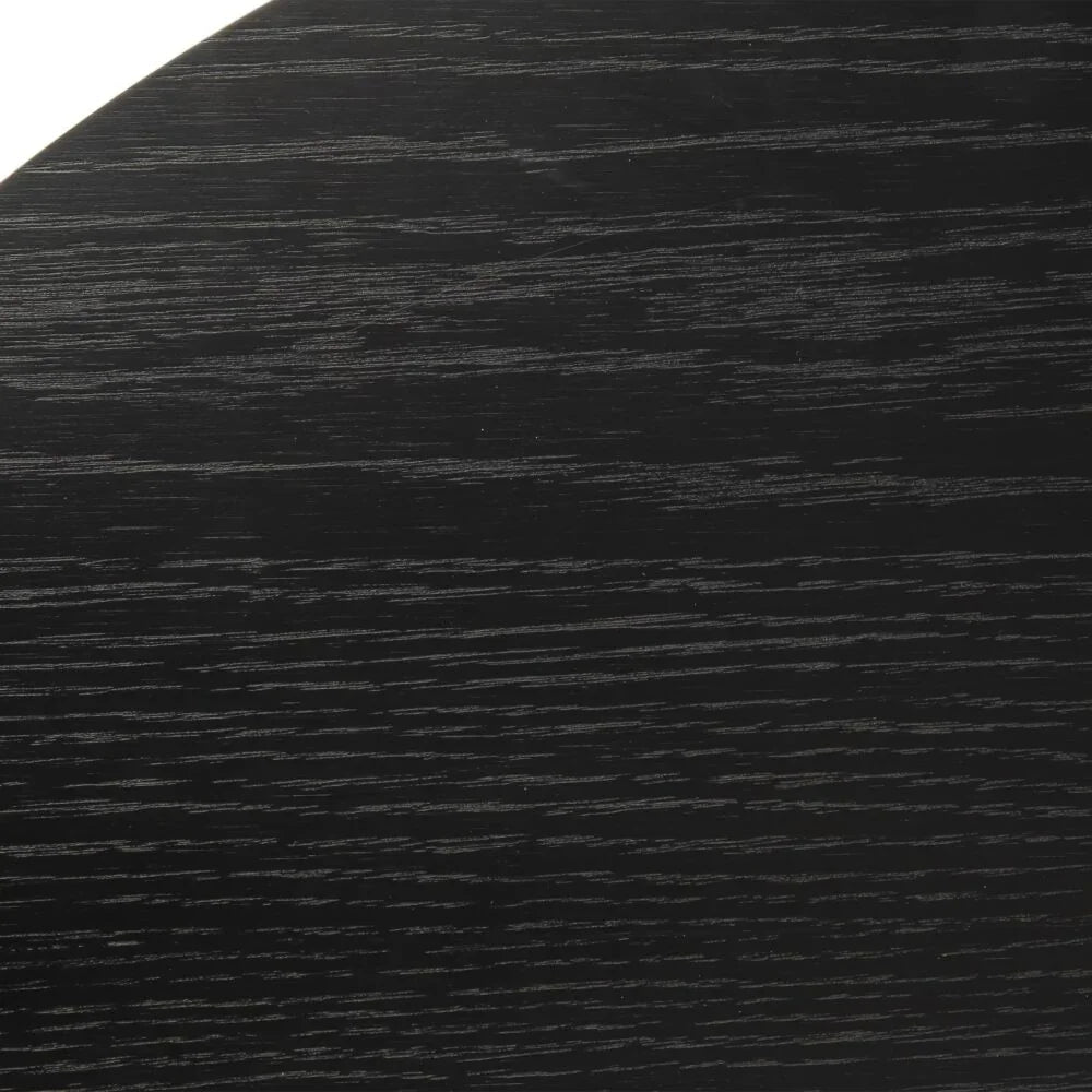 Black wood grain textured table surface close-up