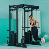 Woman using Cortex V420 Smith machine for triceps dips in modern home gym.