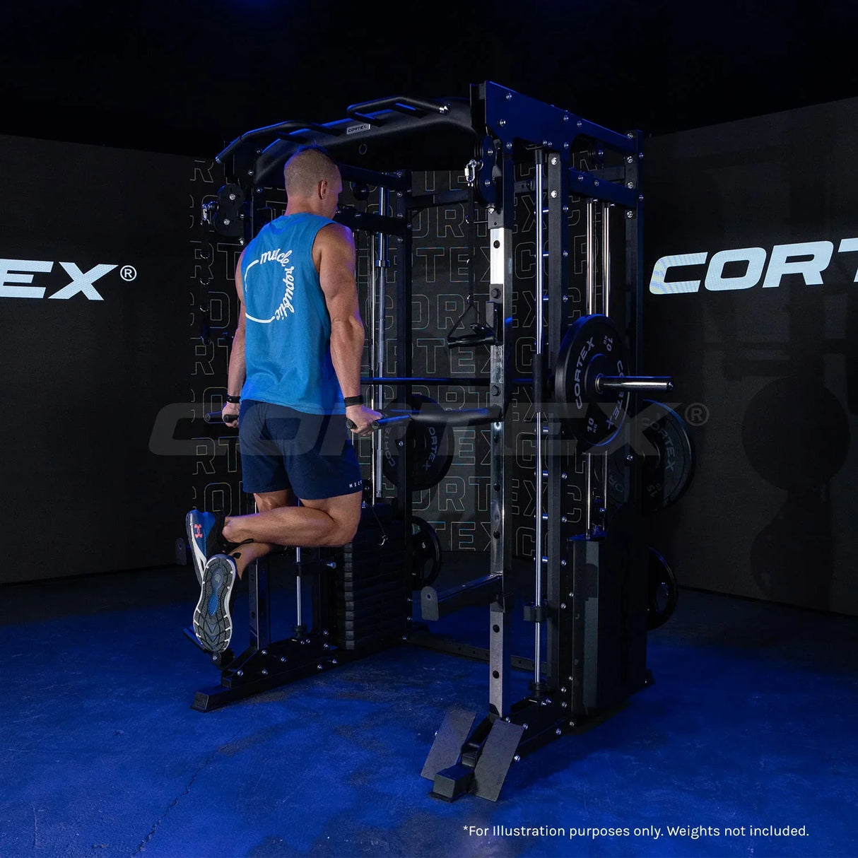 Man using CORTEX power rack machine dip station in gym with dark background