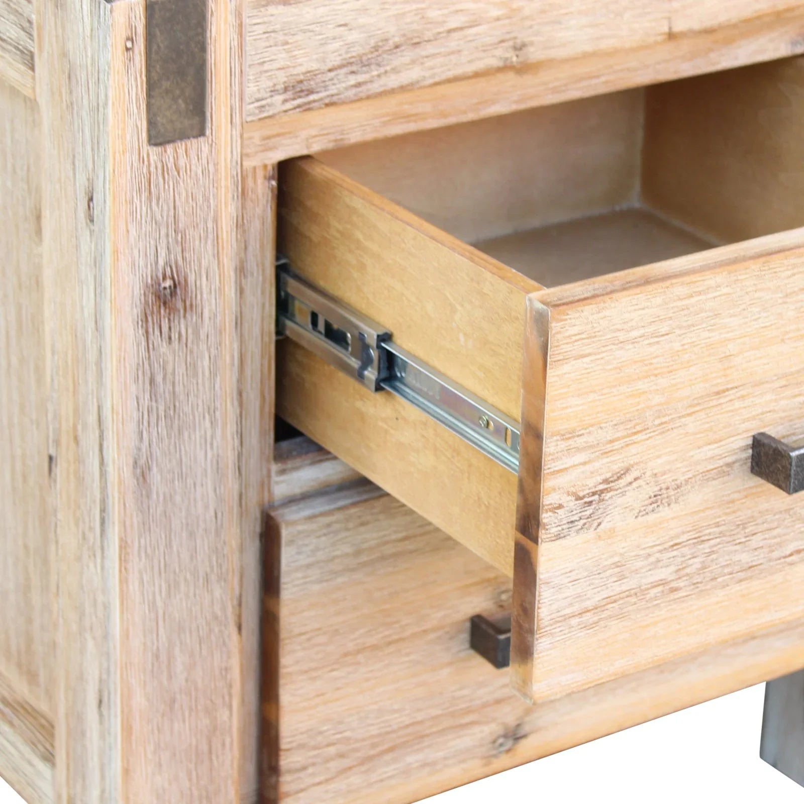 Close-up of a natural oak wood drawer with metal slide rails and modern handle