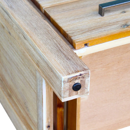 Close-up of oak wood furniture corner with visible grain and metal hardware detail