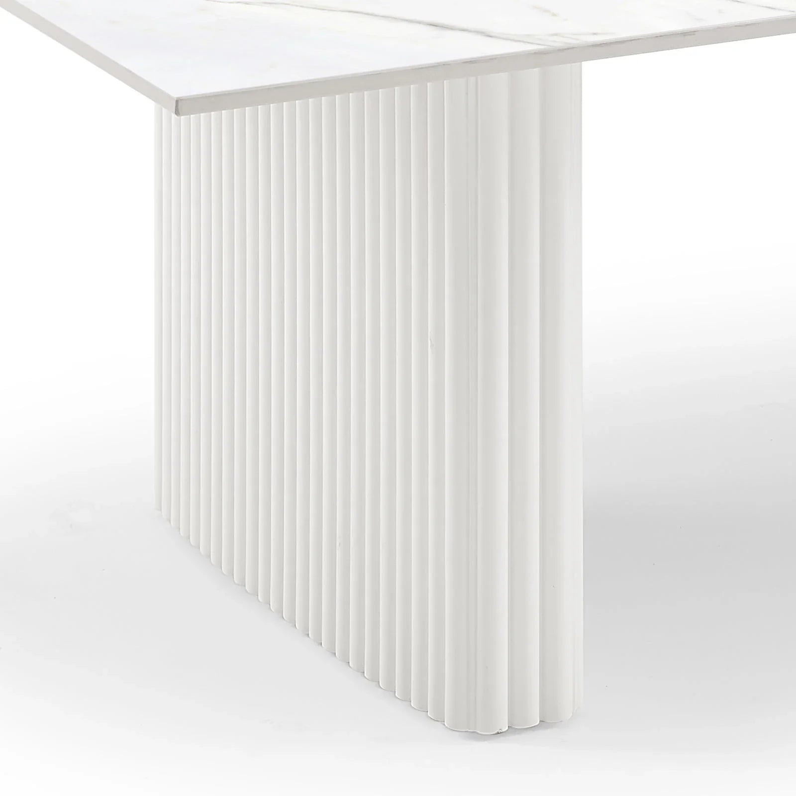 Modern white fluted table base with marble tabletop, minimalist furniture design