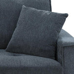 Dark gray modern sofa with matching cushion and soft fabric upholstery