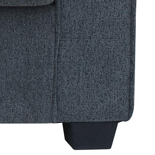 Dark gray fabric sofa corner with black tapered plastic leg, modern furniture detail