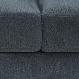 Close-up of dark gray textured upholstered sofa cushions