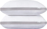 Two white rectangular pillows with breathable gray mesh sides and Gioia Casa labels stacked on white background