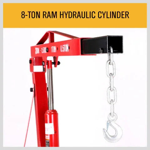 Red hydraulic ram cylinder with chain and hook for lifting, labeled 8-ton capacity