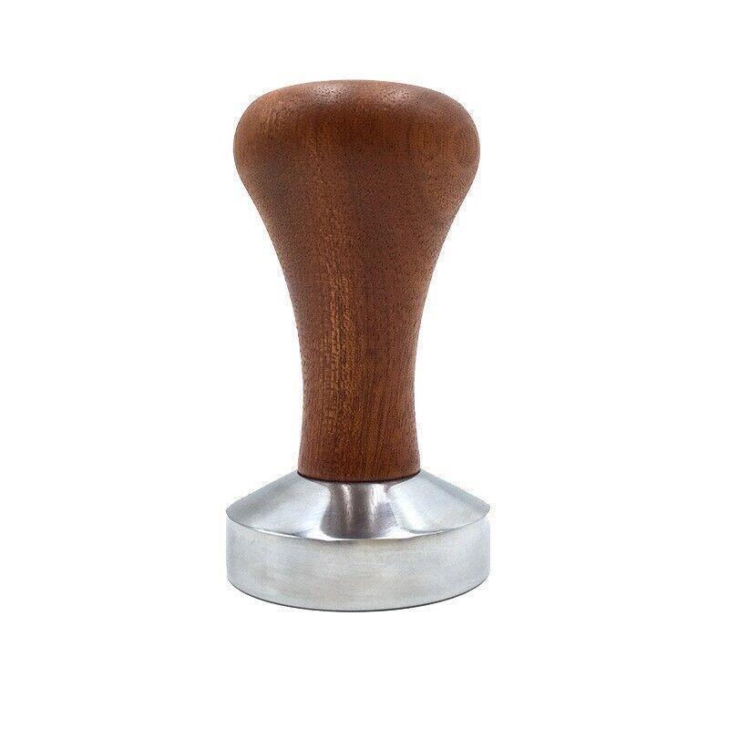 Coffee tamper with smooth wooden handle and stainless steel base on white background