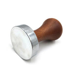 coffee tamper with wooden handle and stainless steel base for espresso preparation