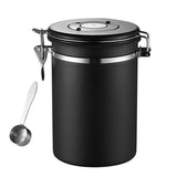 Black airtight metal storage jar with clamp lid and attached measuring scoop