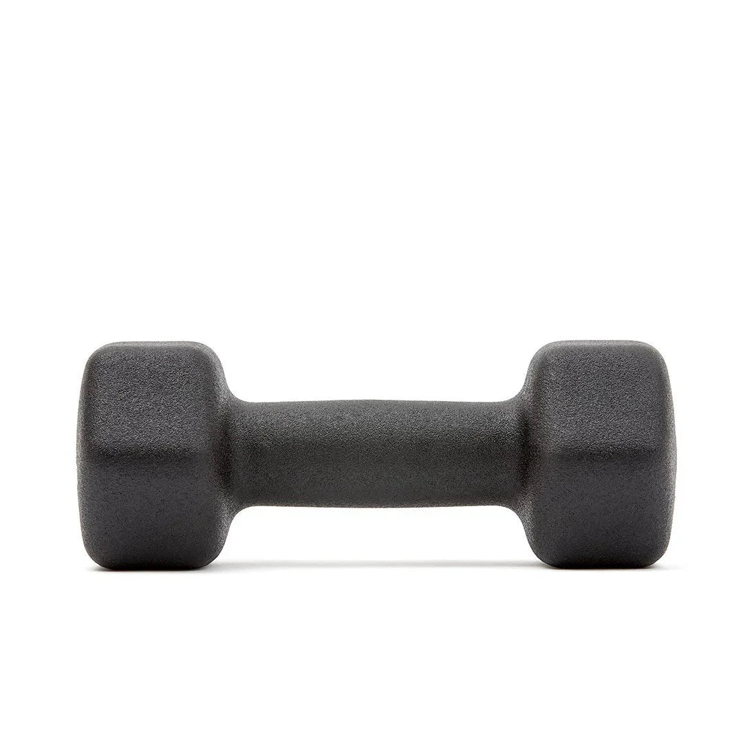 Black textured hexagonal dumbbell on white background fitness equipment